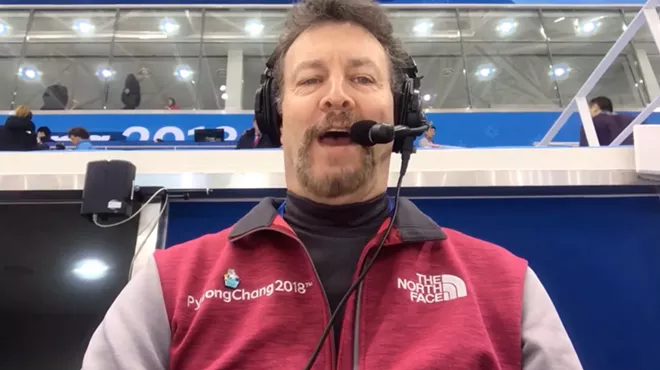 man announcing sports event