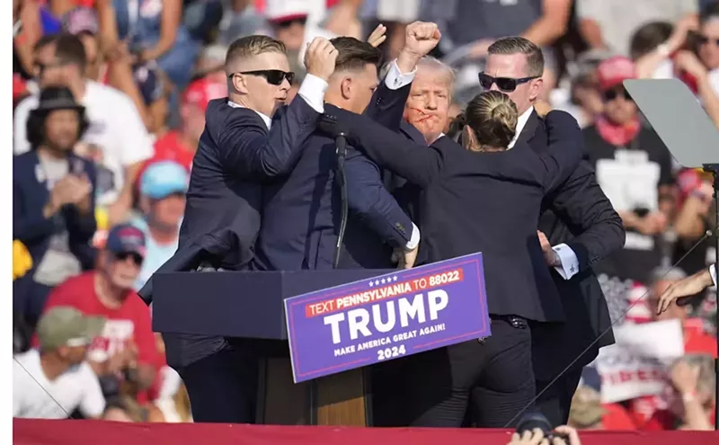Image: Analysis: Trump’s Raised Fist Is a Go-To Gesture With a Long History of Different Meanings