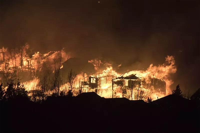 Image: colorado wildfire burning building