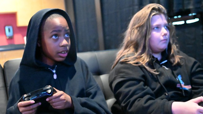 De'Mykal Johnson and Joseph Whitecalf play video games after school with Aurora's new esports program.