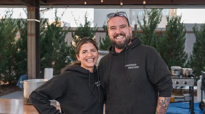 woman and man in black hoodies