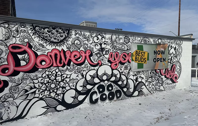 Image: Wall mural in Denver with snow on the sidewalk
