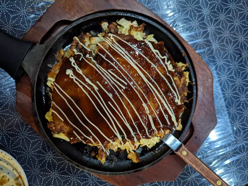 Image: food on a black skillet
