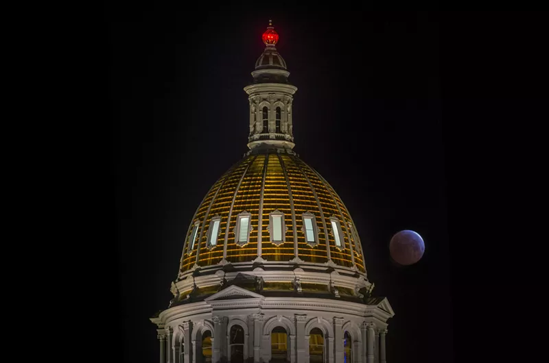 Image: Red moon behind Colorado State Capitol dome
