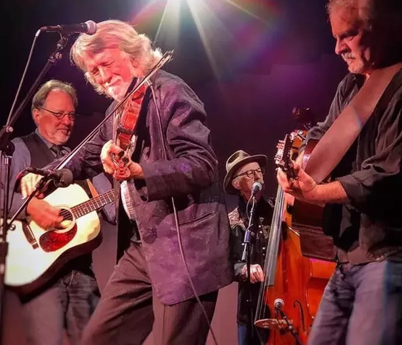 Image: John McEuen plays with the Circle Band.