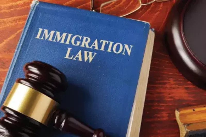 Image: A photo of a book on immigration law.
