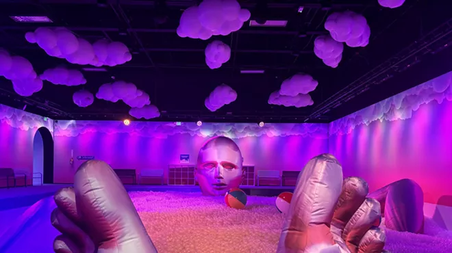 ball pit with a blowup person inside