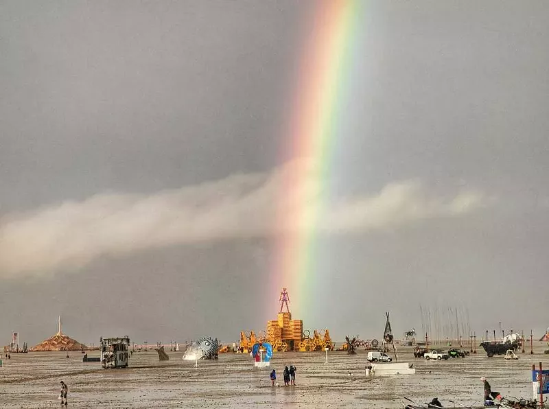 Image: rainbow over wet dessert