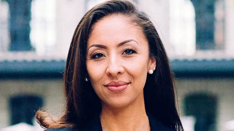 Image: Denver District 9 City Council representative Candi CdeBaca posing for a picture.