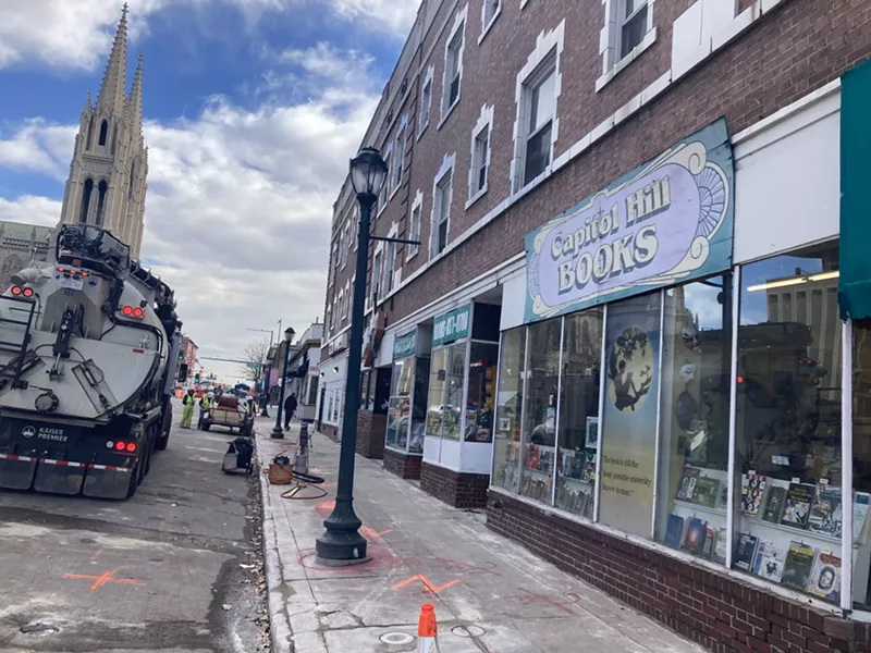 Image: The sidewalk under construction next to Capitol Hill Books
