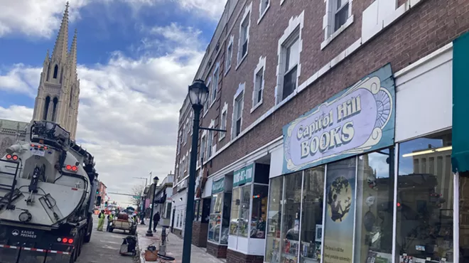 The sidewalk under construction next to Capitol Hill Books