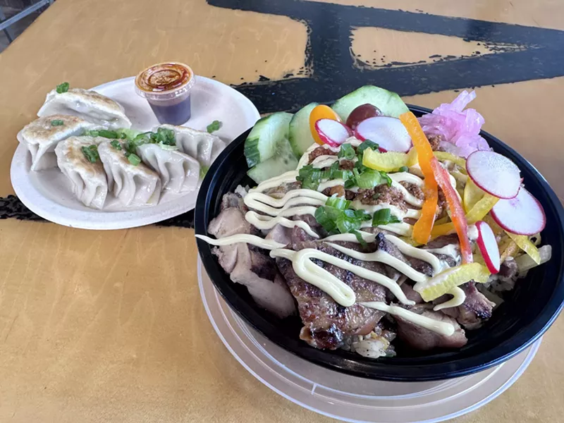 Image: The Power Bowl: Teriyaki chicken, spicy pork, honey and pickled veggies served over pork fried rice and topped with Japanese mayo.