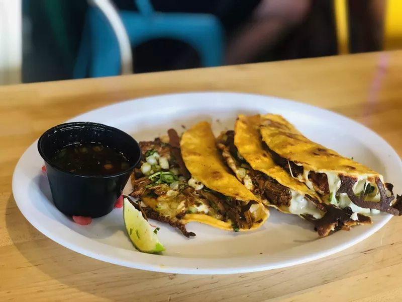 Image: three tacos on a plate