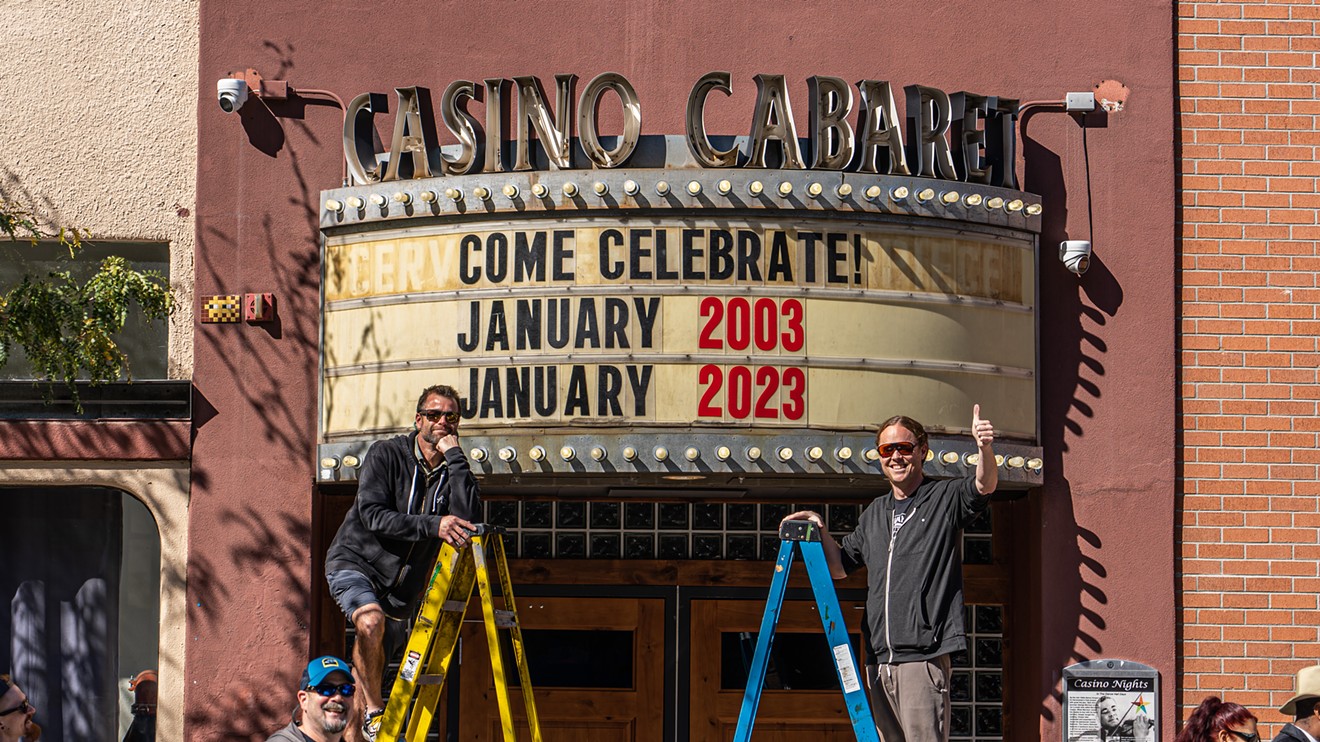 Duncan Goodman and Scott Morrill in front of the marquee.