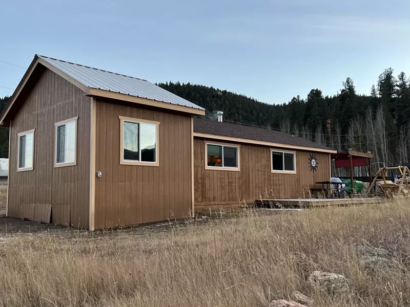 Image: Debbie Stafford's cabin in Bailey was previously a peaceful retreat for her family.