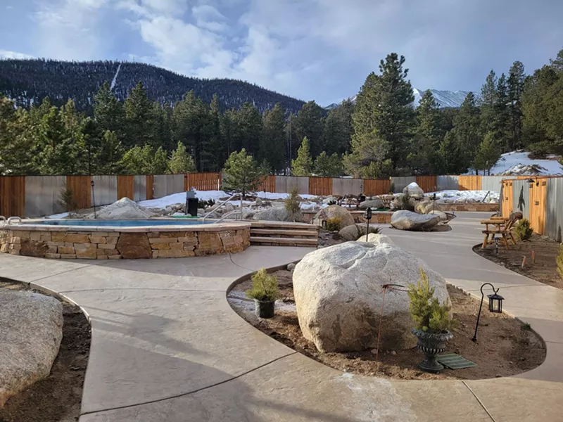 Image: Paved paths leading to stone pools at Charlotte Hot Springs