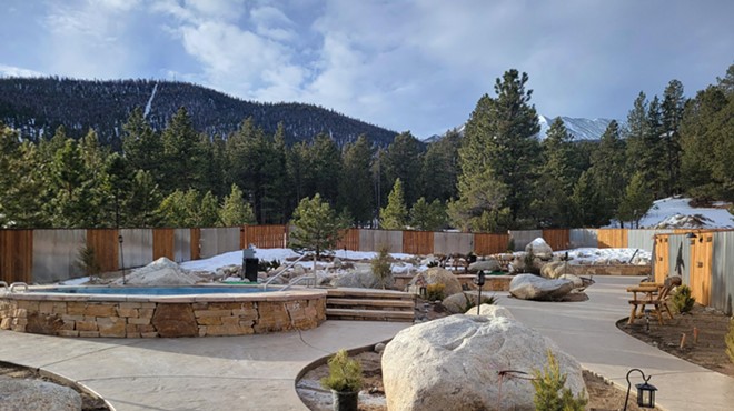 Paved paths leading to stone pools at Charlotte Hot Springs