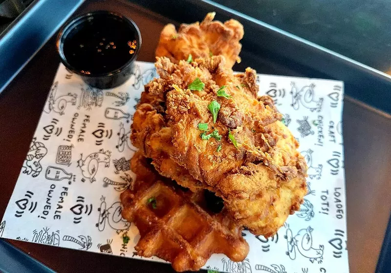Image: Chicken and waffles come with a super crispy Belgian-style waffle.