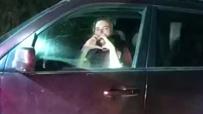 Image: Christian Glass greeted the law-enforcement officers who would soon kill him by making a heart with his hands.