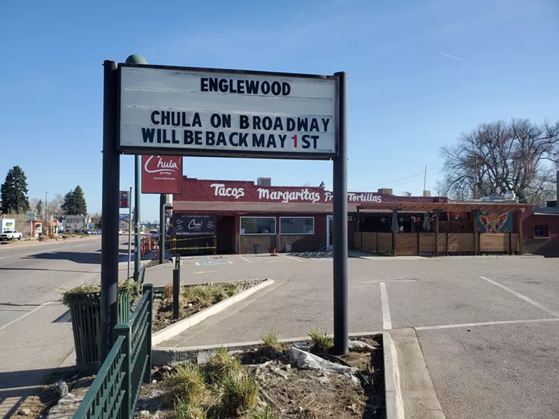 Image: a sign in front of a restaurant