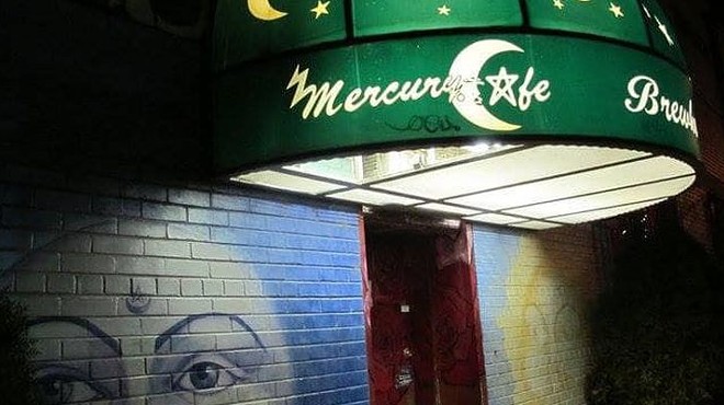 painted sign outside of Mercury Cafe club