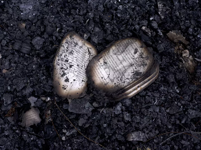 Image: Burned prayers from St. Mary's Baptist Church.