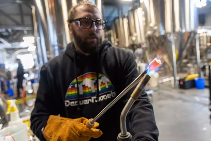 Image: Weldwerks head brewer Skip Schwartz practices with the hot poker.
