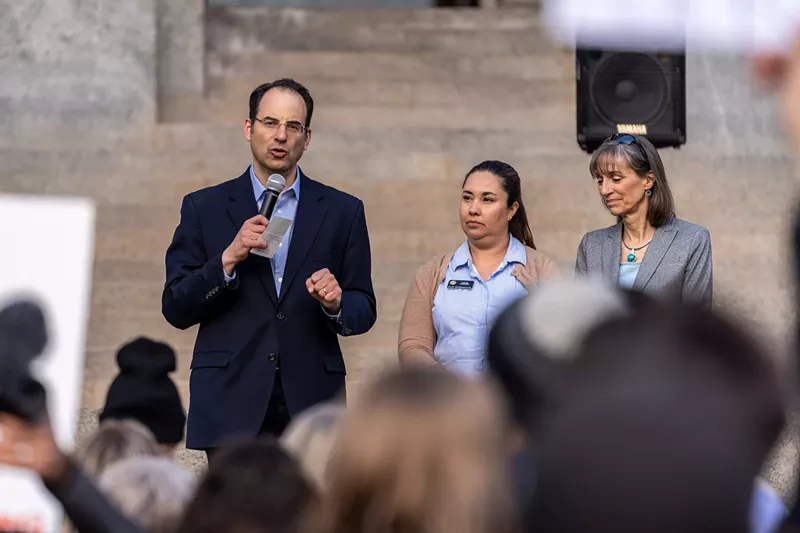 Image: Colorado Attorney General Phil Weiser and Congresswoman Yadira Caraveo speak at a rally.