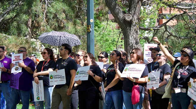 Labor advocates gather at Governor's Park in Denver to rally in support of a just-cause employment ballot measure proposal.