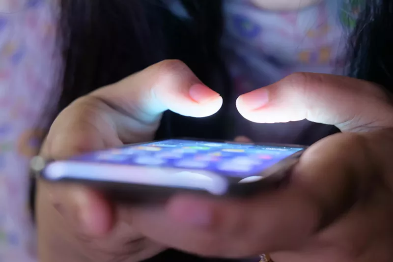 Image: Person using smartphone