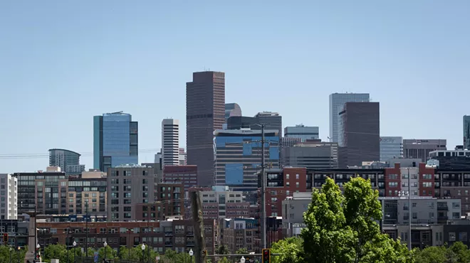 A view of Denver's dense skyline from Avanti Food & Beverage.