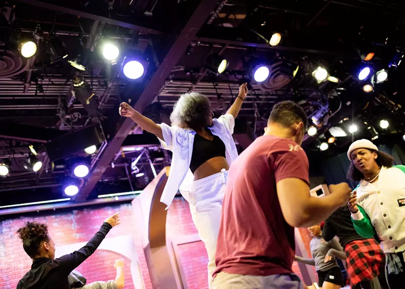 Image: people on stage dancing
