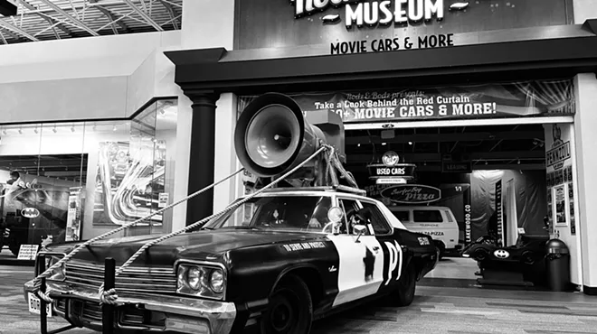 A police car stands in front of the Rodz and Bodz Museum when it was located at Colorado Mills.
