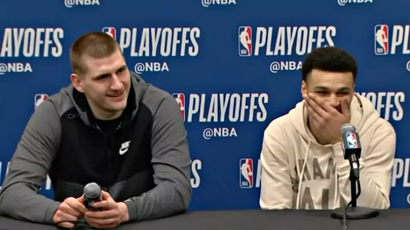 Image: Denver Nuggets' Nikola Jokic and Jamal Murray at a post-victory press conference in April 2019, a few months before Altitude's conflict with Comcast went public.