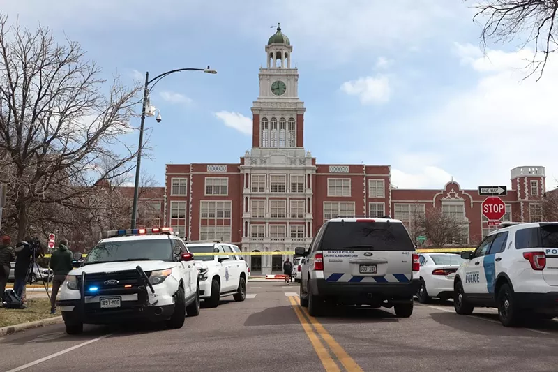 Image: police cars outside of East High School