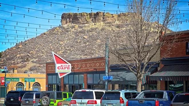 downtown street with rock like castle