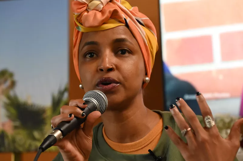 Image: A woman speaks.