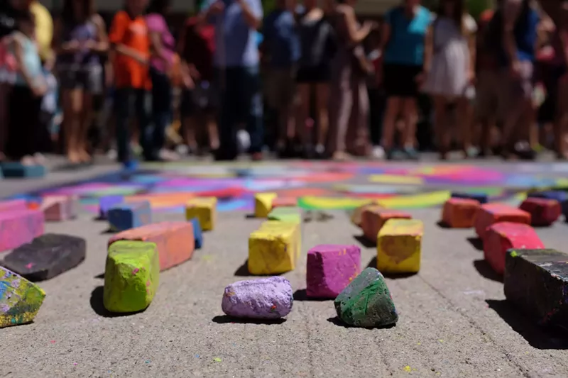 Image: The Denver Chalk Art Festival has been bringing people together for twenty years.