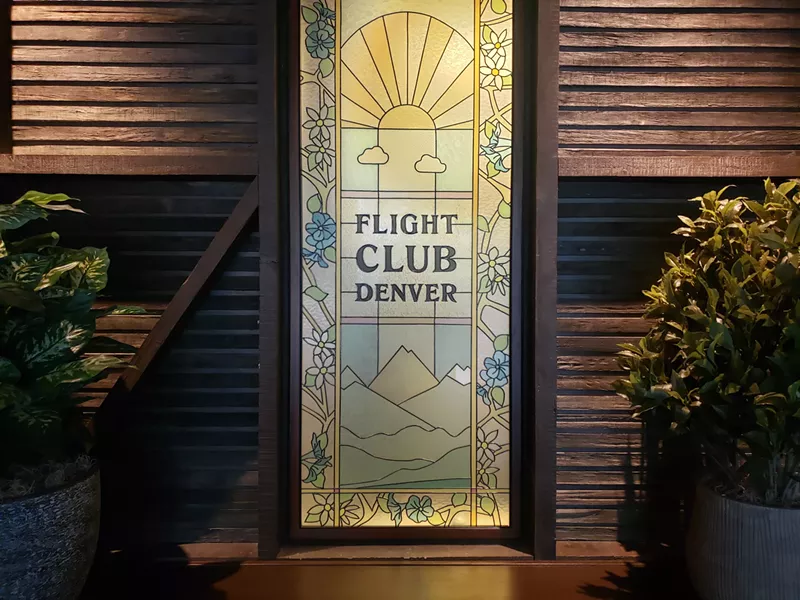 Image: stained glass window that says flight club