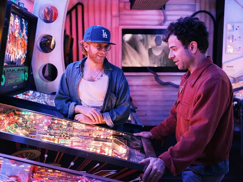 Image: Brothers Taylor (right) and Griffin Goldsmith playing a pinball machine that we hope still exists.