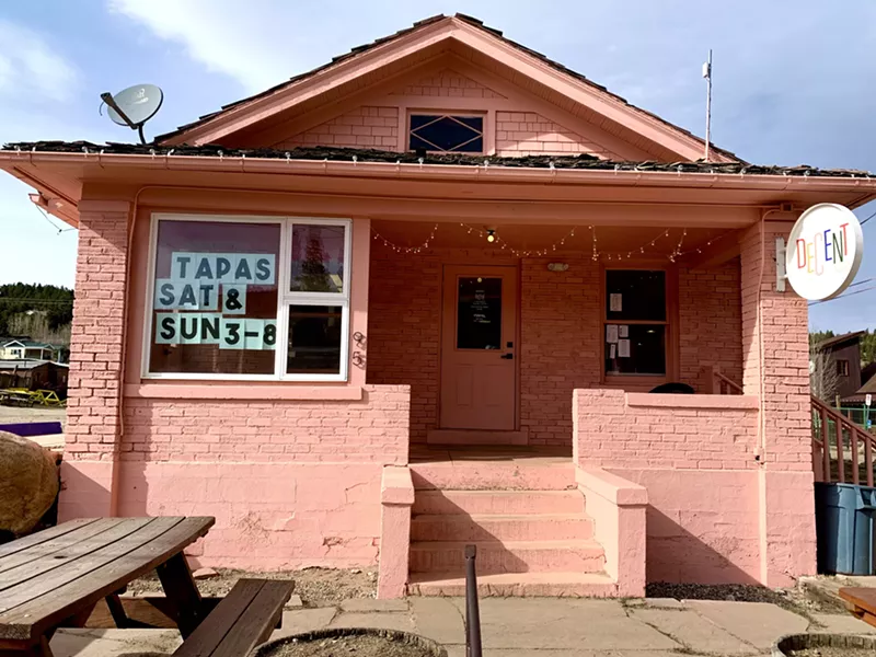 Image: The little pink building overlooks the reservoir in Nederland.