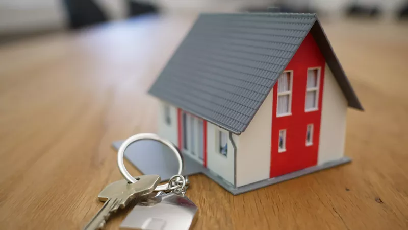 Image: tiny house with keys.