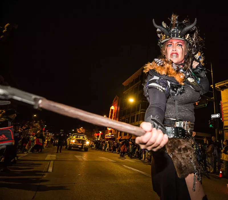 Image: woman in costume with sword