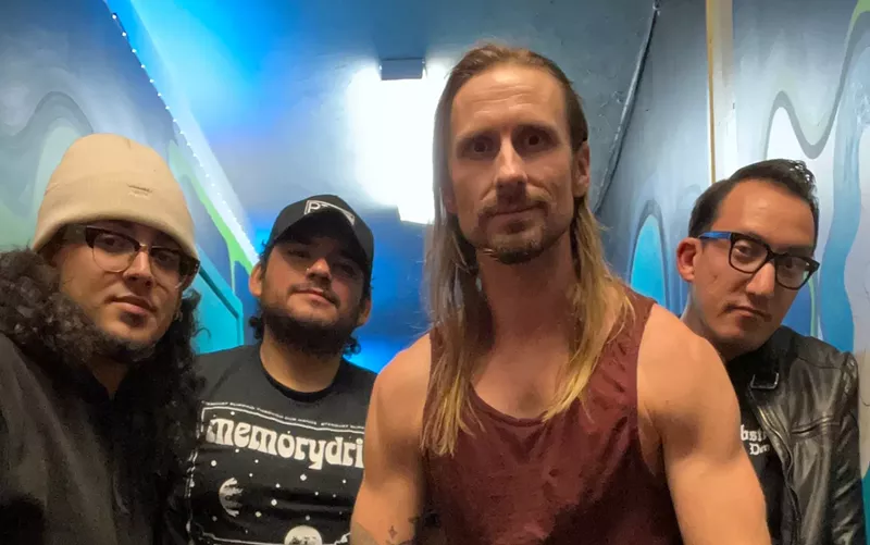 Image: The four members of the Photo Atlas standing together