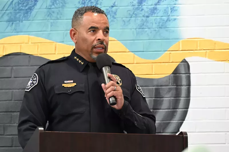 Image: man in uniform at mike.