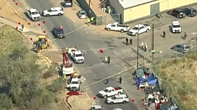 Image: The aftermath of a deadly September 7 hit and run near the intersection of Arkins Court and 29th Street.