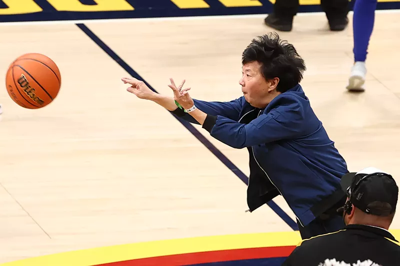 Image: Actor and comedian Ken Jeong shooting a half-court shot at Game One of the NBA finals on June 1, 2023, in Denver, Colorado.
