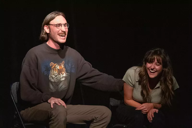 Image: two people laughing