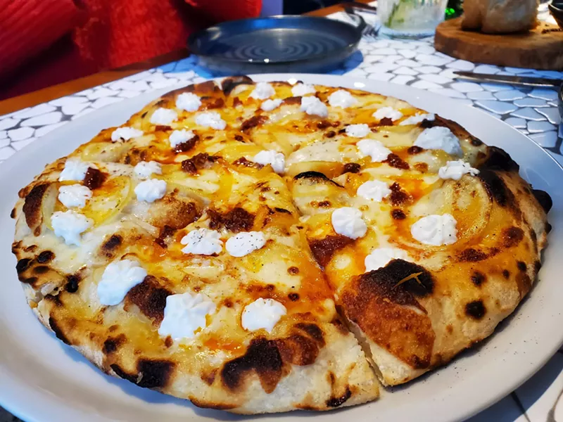 Image: pizza topped with lemon and ricotta