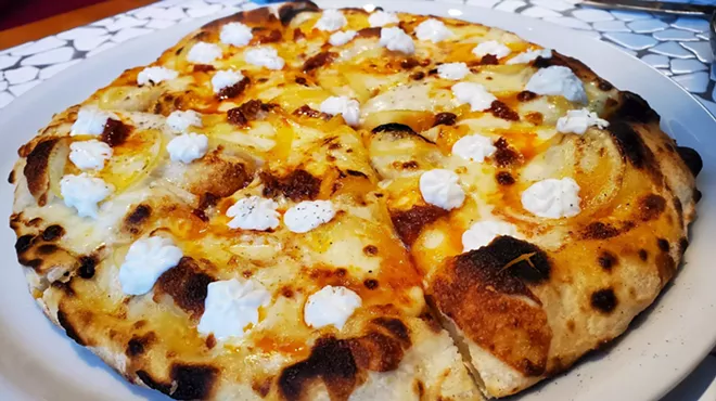 pizza topped with lemon and ricotta